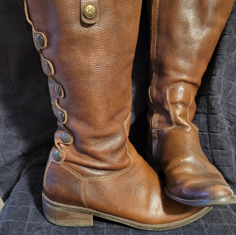 Leather knee high boots.